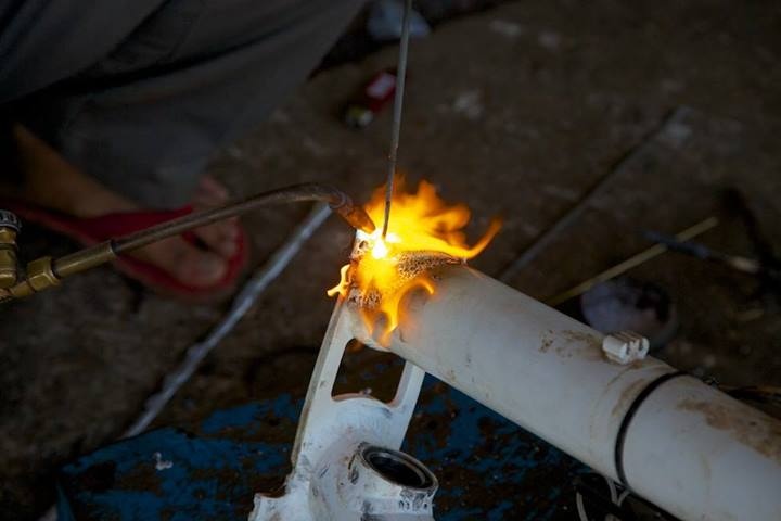 Marcel and Alena's Pino frame getting a new weld in Cambodia.